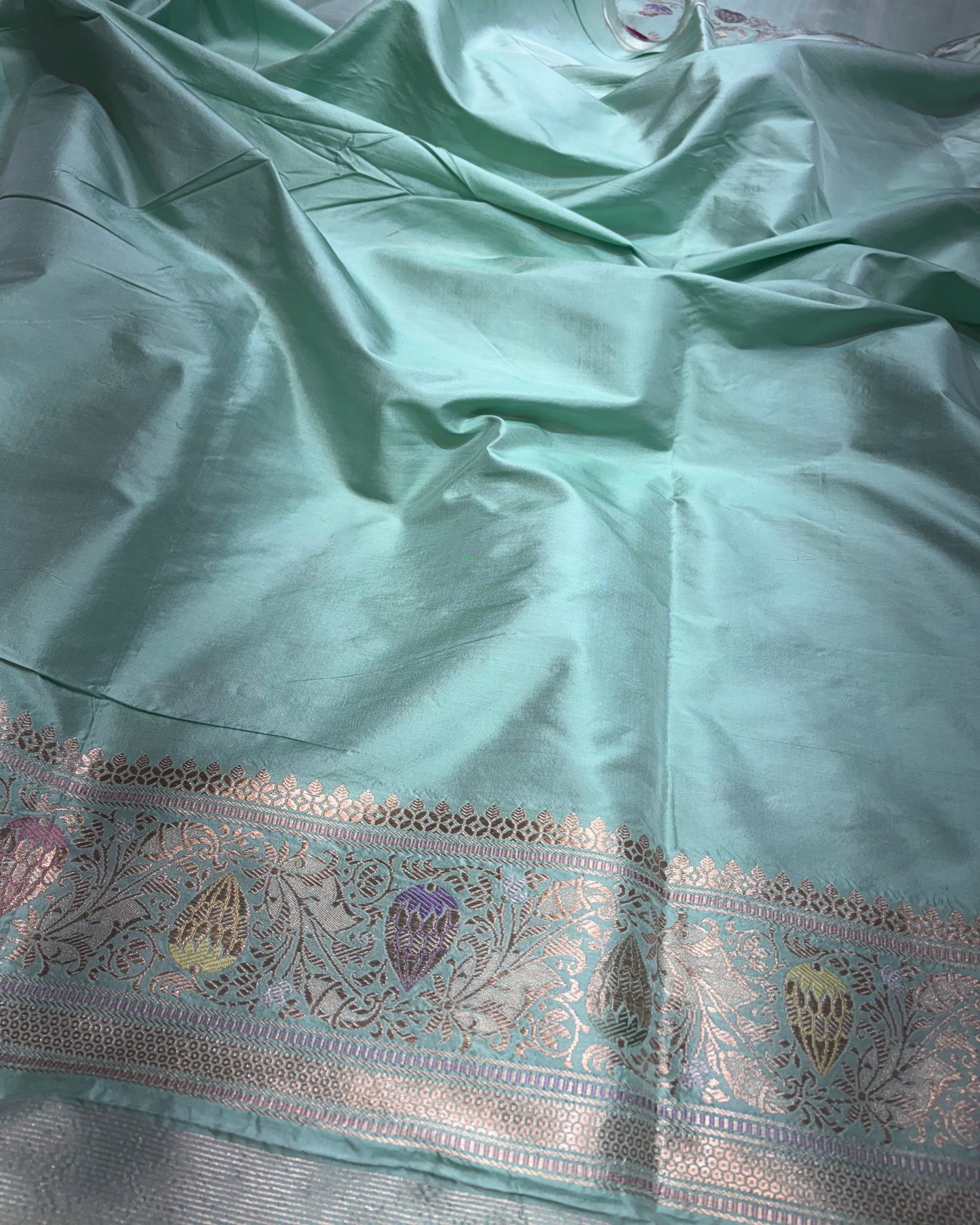 Pure Katan Floral Jaal Jungla in Aqua Blue Colour Weaved with Kadhwa Technique