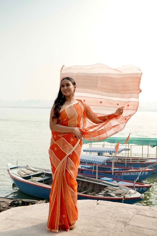 Orange Ektara Half Kora & HAlf Tissue Silk Borderless Zari Anchal Stripe Patta Booti Saree