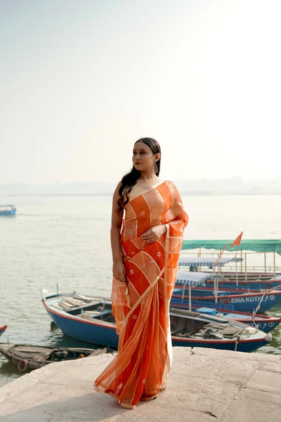 Orange Ektara Half Kora & HAlf Tissue Silk Borderless Zari Anchal Stripe Patta Booti Saree